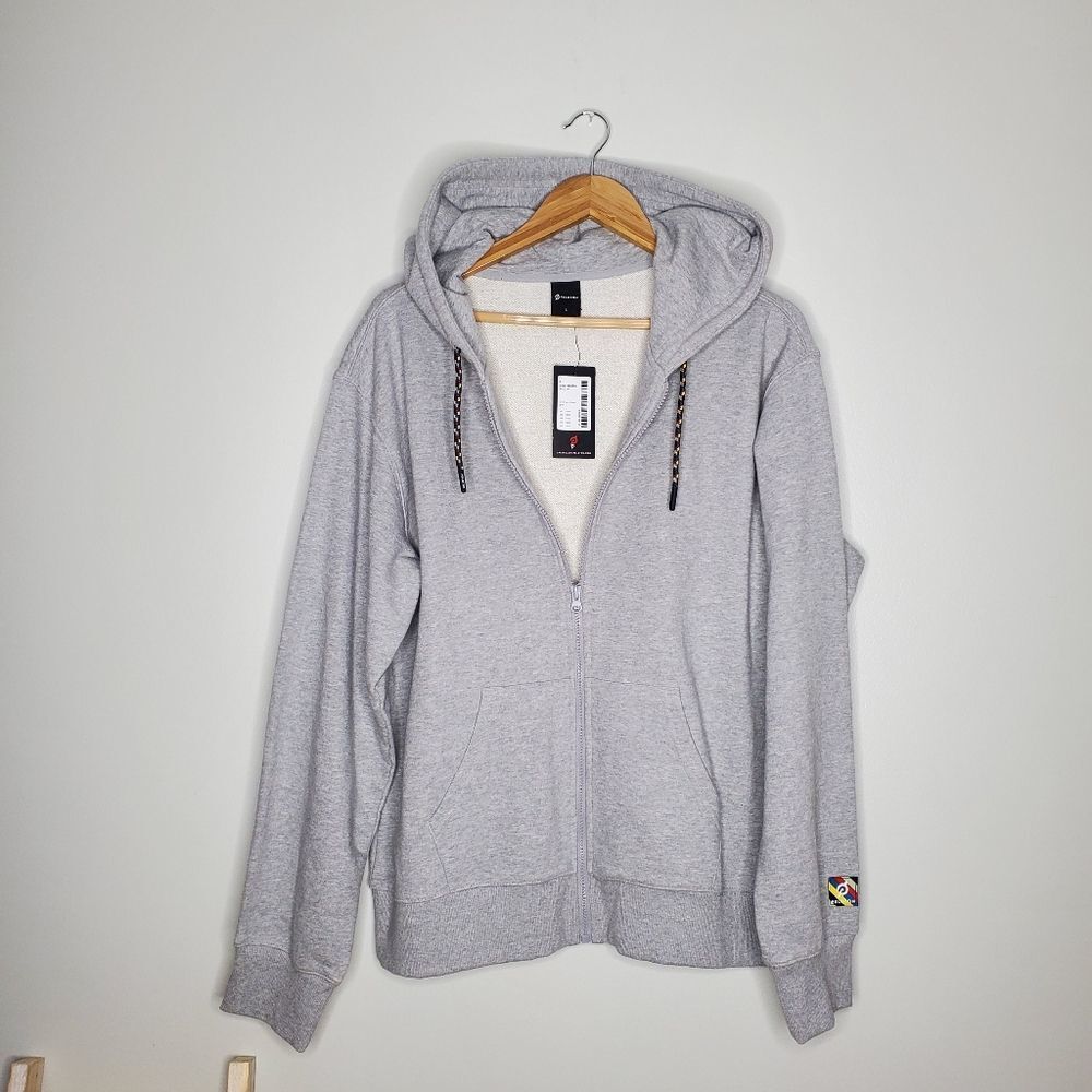 Peloton light gray zip up hoodie unisex with logo on back size large
